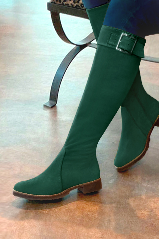 French elegance and refinement for these forest green riding knee-high boots, 
                available in many subtle leather and colour combinations. Record your foot and leg measurements.
We will adjust this pretty boot with zip to your measurements in height and width.
Its large, comfortable gum sole will isolate you from the ground.
You can customise the boot with your own materials, colours and heels on the "My Favourites" page.
To style your boots, accessories are available from the boots page. 
                Made to measure. Especially suited to thin or thick calves.
                Matching clutches for parties, ceremonies and weddings.   
                You can customize these knee-high boots to perfectly match your tastes or needs, and have a unique model.  
                Choice of leathers, colours, knots and heels. 
                Wide range of materials and shades carefully chosen.  
                Rich collection of flat, low, mid and high heels.  
                Small and large shoe sizes